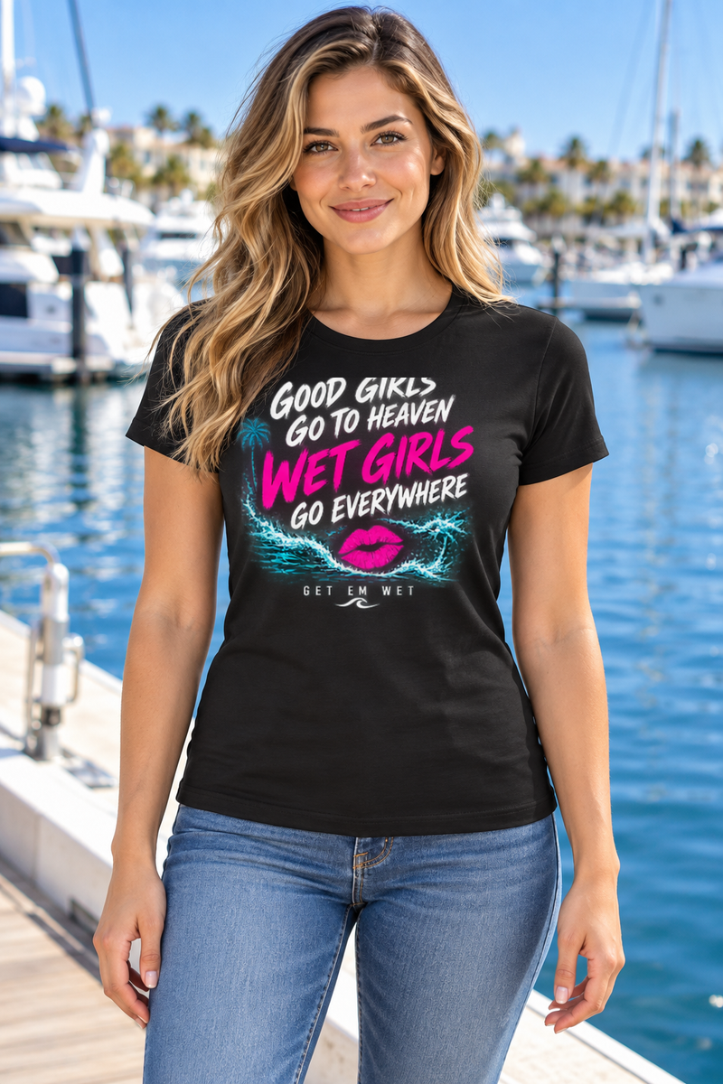 Woman modeling the Good Girls Wet Girls Get Em Wet T-shirt at a marina